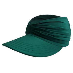 Detail of dark green sun visor hat showing knit fabric texture and front knot decoration