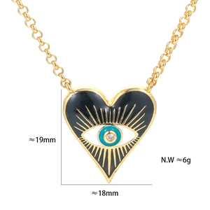 Detail view of gold evil eye heart pendant with precise measurements of 19mm by 18mm