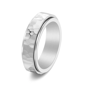 Close-up of silver hammered texture titanium ring featuring a double-layer rotating design