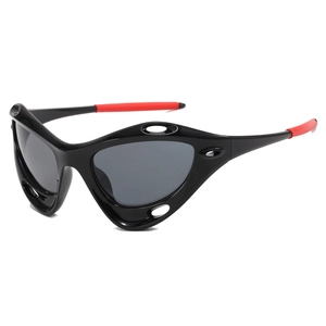 Futuristic Y2K sports sunglasses with black frames and red rubber tips on a white background
