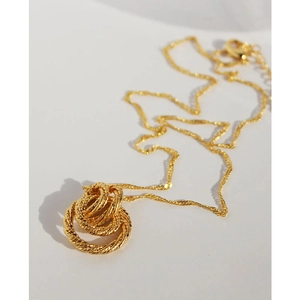 Vintage style gold twisted triple ring pendant necklace with minimalist design for women