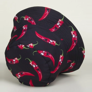 Close-up of black bucket hat with cartoon chili print and high-quality canvas texture