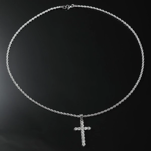 Silver iced out cross pendant necklace with twist chain on a premium black background