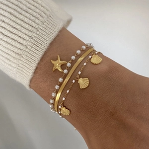 Layered gold starfish and pearl shell bracelet set for minimalist summer ocean jewelry