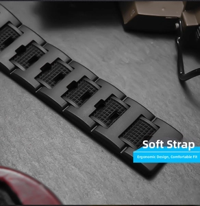 Close-up of flexible black silicone watch strap with ergonomic textured grid design