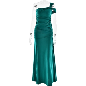 Detail of ruched teal one-shoulder formal dress with side slit and slim fit silhouette