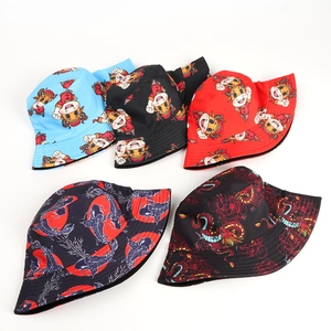 Cappelli a secchiello reversibili con stampe di bue cartoon e motivi di draghi cinesi vari