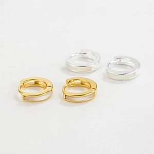 Close-up of S925 sterling silver hoop earrings with white mother of pearl inlay in gold and silver