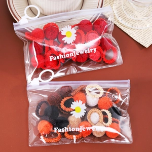 Lot de chouchous en peluche avec pompons rouges, noirs et marrons pour enfants
