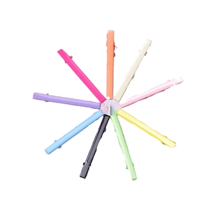Set of 6cm slim metal duckbill hair clips in ten vibrant colors on white background