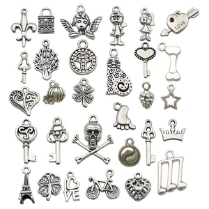 Set of 25 silver antique alloy charms including heart and key shapes for DIY jewelry