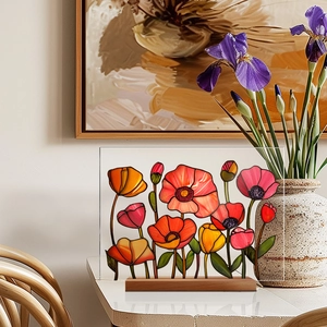 Poppy flower acrylic desk decor with wood base on white table with floral background