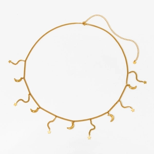 Golden stainless steel waist chain with celestial star and moon pendants on a white background