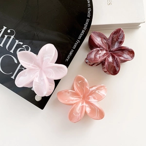 Elegant floral hair claws in marble acetate finish, peach and burgundy flower clips