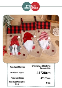 Detail view of 45x28cm Christmas stockings featuring gnome designs and red plaid cuffs