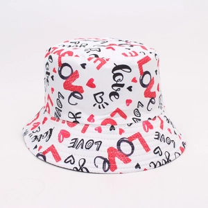 White bucket hat featuring red and black LOVE letters and heart doodle patterns