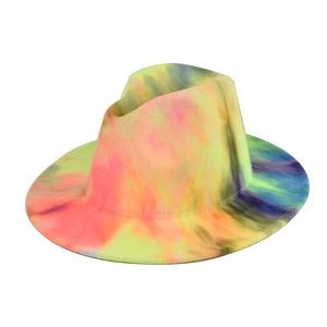 Detailed shot of neon tie-dye fedora hat with vibrant yellow and orange felt textures
