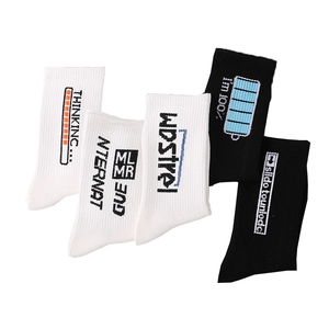White and black cotton crew socks set featuring creative letter printing and battery icons