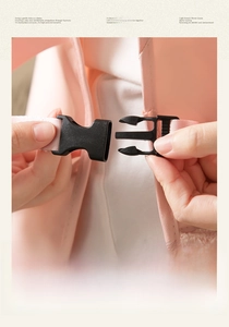 Detail of pink apron side buckle design for easy wearing and professional comfort