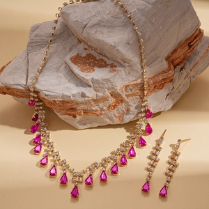 Luxury gold drop fringe jewelry set with magenta waterdrop crystals and rhinestones