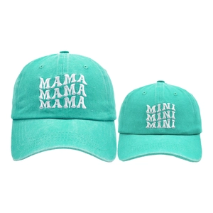 Detail of mint green parent-child baseball cap set with MAMA and MINI 3D embroidery