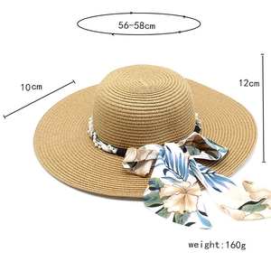 Detailed size parameters of straw sun hat with pearl trim and floral ribbon bow detail