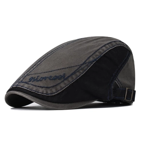 Detail view of cotton flat cap featuring contrast stitching and Morecool embroidery