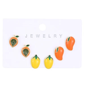 Detailed view of colorful enamel fruit stud earrings on white jewelry display card