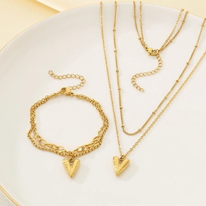 Double-layered 18K gold plated heart necklace and bracelet set with hammered texture