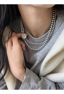 Double-layered gray pearl necklace with a vintage silver square diamond-set pendant
