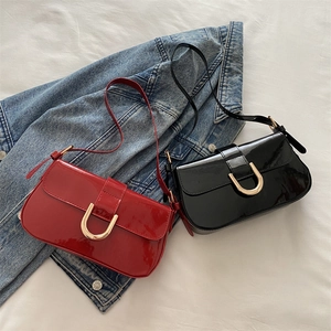 Retro patent leather shoulder bag with gold horseshoe buckle in red and black colors