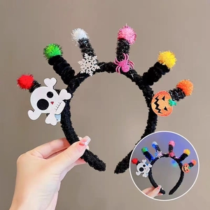LED Halloween headband with pumpkin and skull charms featuring colorful glowing lights
