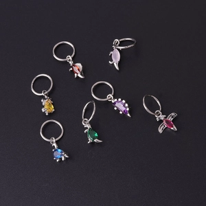Set of seven stainless steel dinosaur hoop earrings with vibrant colorful zircon stones