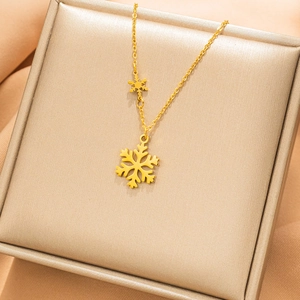 Minimalist 18K gold plated snowflake pendant necklace displayed in a luxury gift box
