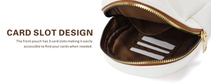 Detail view of the white canvas bag interior with three dedicated card slots and gold zipper