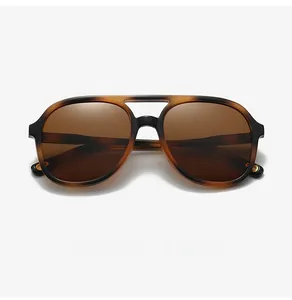 Close-up of classic aviator sunglasses featuring a double bridge and tortoiseshell frame