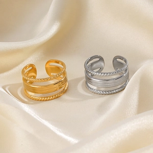 Three-layer 18K gold and silver plated open rings with twisted texture on silk background