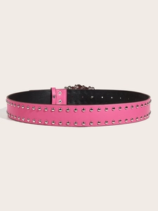 Pink punk belt with silver studs featuring a heart and angel wing buckle detail