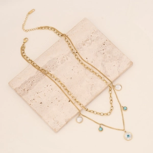 Gold layered stainless steel necklace with turquoise evil eye and round pendants