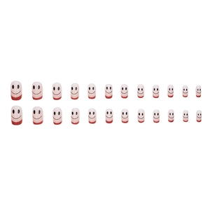 Short round French press-on nails with red smile faces and translucent pink base