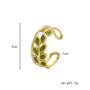 Macro view of green enamel leaf ring details with height and weight specifications