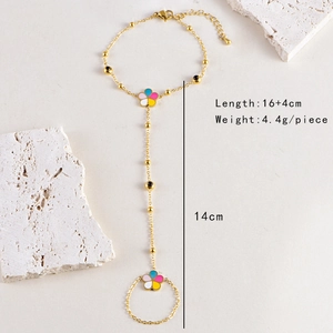 Détail du bracelet bague floral doré avec spécifications de taille et poids exact