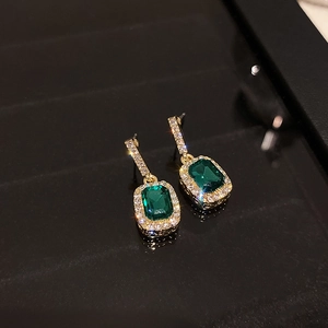 Elegant French court style gold earrings with emerald green crystals and zircon accents