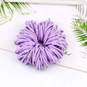 Elastic candy color hair bands for children in purple with plastic buckles in a ring layout
