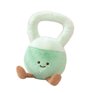 Peluche a forma di kettlebell verde con viso ricamato e sottili gambe marroni