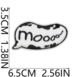 Detail view of cow embroidery patch with dimensions showing 6.5x3.5cm and Moooo text