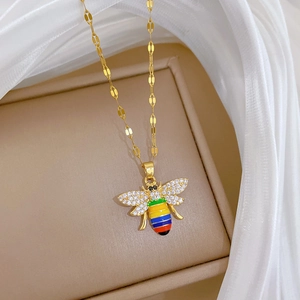 Titanium steel necklace with gold bee pendant, rainbow enamel wings and cubic zirconia