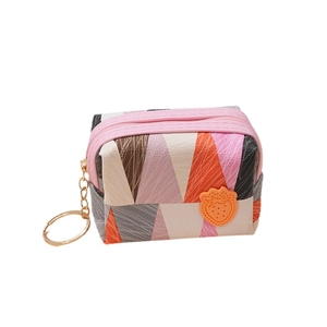 Mini geometric patchwork coin purse with strawberry patch and gold keychain in pink and orange