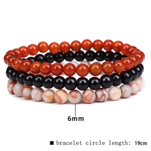 Detail view of 6mm natural stone bead bracelets with 19cm elastic length in three colors