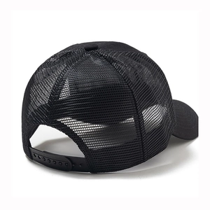 Detail of adjustable black plastic strap and breathable mesh on the baseball cap